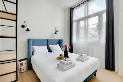 Un ou plusieurs lits dans un hébergement de l'établissement Luxurious apartment - 2BR-6P - Javel-Tour Eiffel