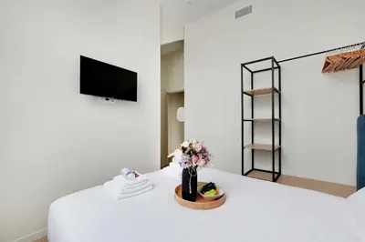 Un ou plusieurs lits dans un hébergement de l'établissement Luxurious apartment - 2BR-6P - Javel-Tour Eiffel