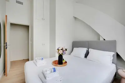 Un ou plusieurs lits dans un hébergement de l'établissement Luxurious apartment - 2BR-6P - Javel-Tour Eiffel