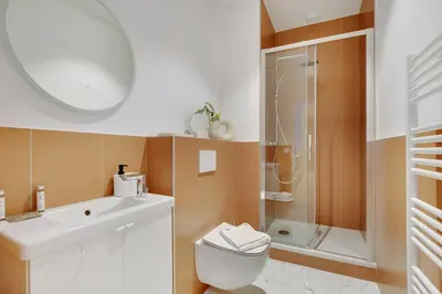 Salle de bains dans l'établissement Modern Apartment - 2BR-6P - Eiffel Tower