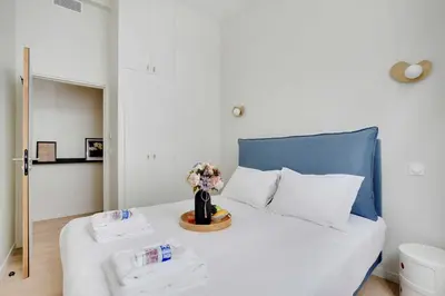 Un ou plusieurs lits dans un hébergement de l'établissement Modern Apartment - 2BR-6P - Eiffel Tower