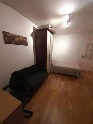 Un ou plusieurs lits dans un hébergement de l'établissement STUDIO PARIS BASTILLE