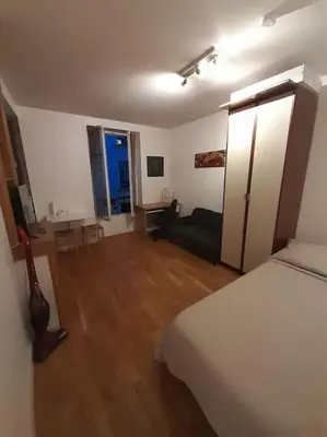 Un ou plusieurs lits dans un hébergement de l'établissement STUDIO PARIS BASTILLE