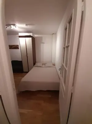 Un ou plusieurs lits dans un hébergement de l'établissement STUDIO PARIS BASTILLE