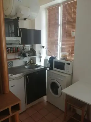 Cuisine ou kitchenette dans l'établissement STUDIO PARIS BASTILLE