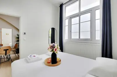 Un ou plusieurs lits dans un hébergement de l'établissement Magnificent apartment - 2BR-6P - Eiffel Tower