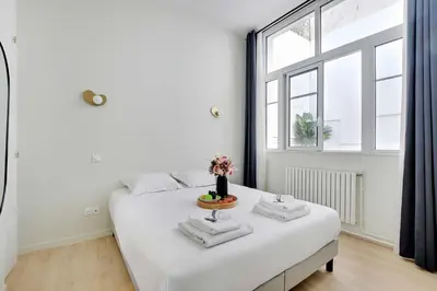 Un ou plusieurs lits dans un hébergement de l'établissement Magnificent apartment - 2BR-6P - Eiffel Tower