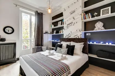 Un ou plusieurs lits dans un hébergement de l'établissement Sweett - Pavillon Saint-Germain