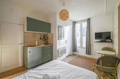 Un ou plusieurs lits dans un hébergement de l'établissement Magnifique appartement au centre de Paris 44