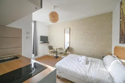 Un ou plusieurs lits dans un hébergement de l'établissement Magnifique appartement au centre de Paris 44