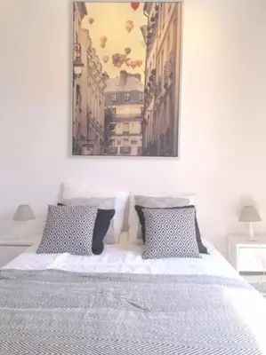 Un ou plusieurs lits dans un hébergement de l'établissement So cute typical french apartment (46)