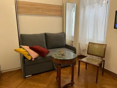 Coin salon dans l'établissement Studio de Charme de Verneuil