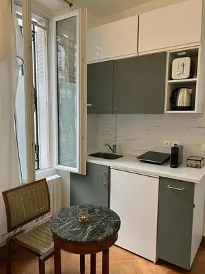 Cuisine ou kitchenette dans l'établissement Studio de Charme de Verneuil
