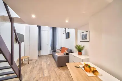 Coin salon dans l'établissement Bel appartement au coeur de Montmartre