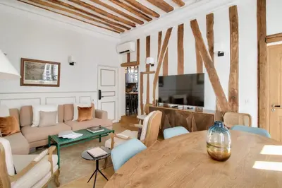Coin salon dans l'établissement Grandiose appartement au cœur de Paris