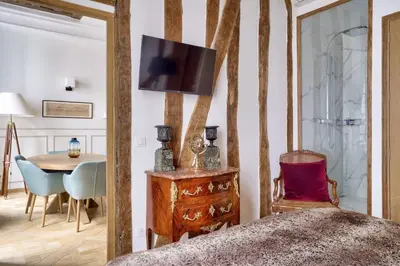 Coin salon dans l'établissement Grandiose appartement au cœur de Paris