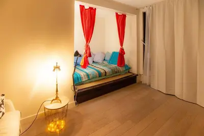 Un ou plusieurs lits dans un hébergement de l'établissement Studio with Balcony
