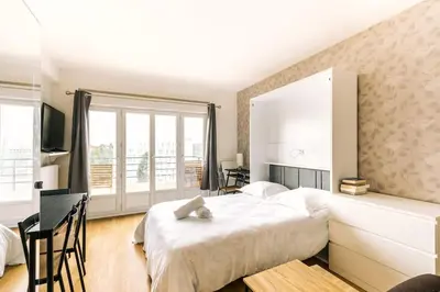 Un ou plusieurs lits dans un hébergement de l'établissement Marvellous Studio Paris 14