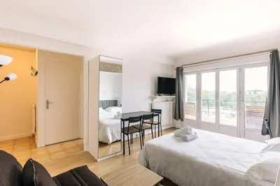 Un ou plusieurs lits dans un hébergement de l'établissement Marvellous Studio Paris 14