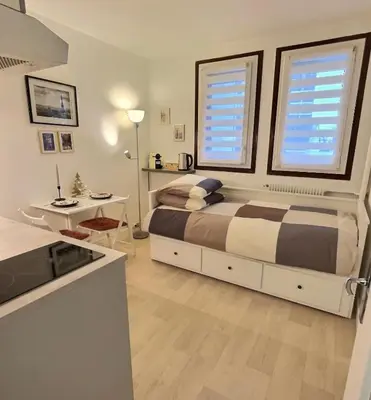 Un ou plusieurs lits dans un hébergement de l'établissement Studio confort Vanves Paris Porte de Versailles
