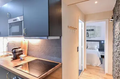 Cuisine ou kitchenette dans l'établissement Paris La Villette - Charming Apartment 2 rooms