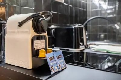 Cuisine ou kitchenette dans l'établissement La Nuance Boisée - Proche Marais - By MonPetitFaré