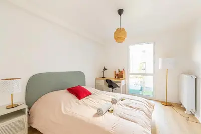 Un ou plusieurs lits dans un hébergement de l'établissement Your cosy apartment close to Paris