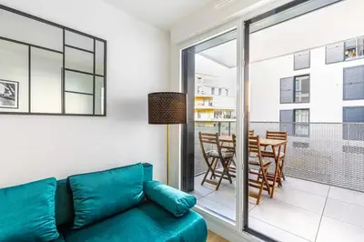 Coin salon dans l'établissement Your cosy apartment close to Paris