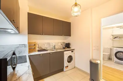 Cuisine ou kitchenette dans l'établissement Your cosy apartment close to Paris