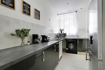 Cuisine ou kitchenette dans l'établissement Classy appartment - Arc de Triomphe