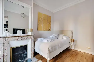 Un ou plusieurs lits dans un hébergement de l'établissement Charming Studio - 2P- Parc Monceau