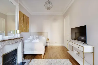 Un ou plusieurs lits dans un hébergement de l'établissement Charming Studio - 2P- Parc Monceau