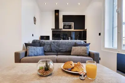 Coin salon dans l'établissement Appartement aux Portes de Paris