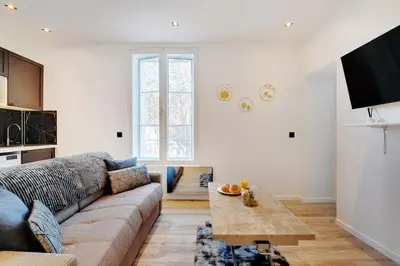 Télévision ou salle de divertissement dans l'établissement Appartement aux Portes de Paris