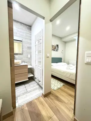 Un ou plusieurs lits dans un hébergement de l'établissement Elegant apartment - 2BR-5P - Champs de Mars