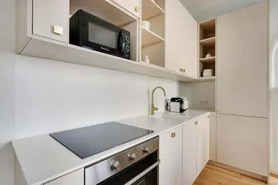 Cuisine ou kitchenette dans l'établissement Pick A Flat's Apartments in Opéra - Rue d'Hauteville