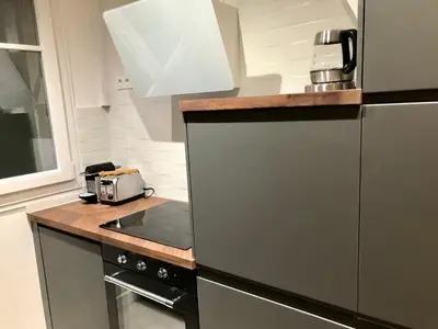 Cuisine ou kitchenette dans l'établissement Rare appartement d'architecte en haut de Montmartre