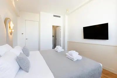 Un ou plusieurs lits dans un hébergement de l'établissement Pick A Flat's Apartment in Opéra - Rue Saint Marc