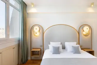 Un ou plusieurs lits dans un hébergement de l'établissement Pick A Flat's Apartment in Opéra - Rue Saint Marc