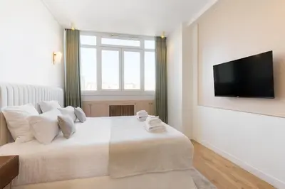Télévision ou salle de divertissement dans l'établissement Pick A Flat's Apartment in Opéra - Rue Saint Marc