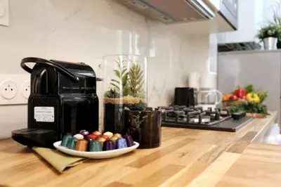 Cuisine ou kitchenette dans l'établissement Chaleureux 100m2 3CH - Séjour Romantique Parfait
