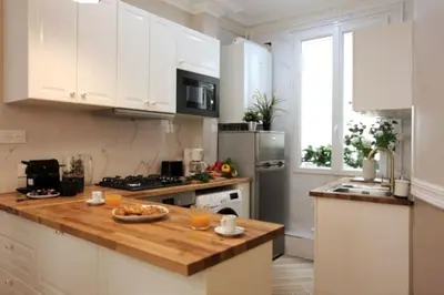 Cuisine ou kitchenette dans l'établissement Chaleureux 100m2 3CH - Séjour Romantique Parfait