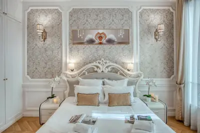 Un ou plusieurs lits dans un hébergement de l'établissement Luxueux 200m2 5CH Champs Elysées à 1min Perle Rare