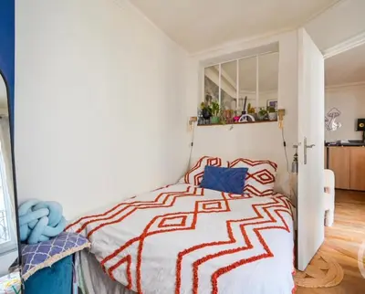 Un ou plusieurs lits dans un hébergement de l'établissement Appartement cosy quartier Gambetta