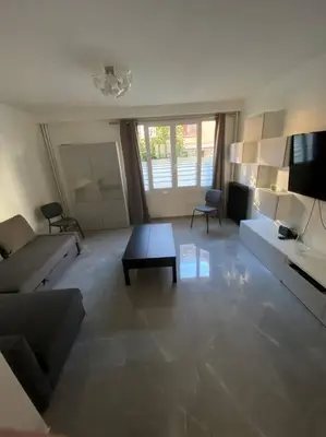 Coin salon dans l'établissement Superbe appartement Vanves T3 avec parking