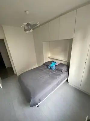 Un ou plusieurs lits dans un hébergement de l'établissement Superbe appartement Vanves T3 avec parking