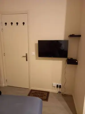 Télévision ou salle de divertissement dans l'établissement Paris XV: Superbe appartement