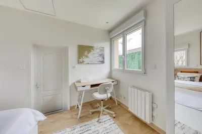 Un ou plusieurs lits dans un hébergement de l'établissement Gold&Silver Quiet House Pro-Family