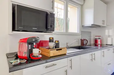 Cuisine ou kitchenette dans l'établissement Gold&Silver Quiet House Pro-Family