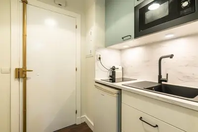Cuisine ou kitchenette dans l'établissement Appartement proche Champs Elysées
